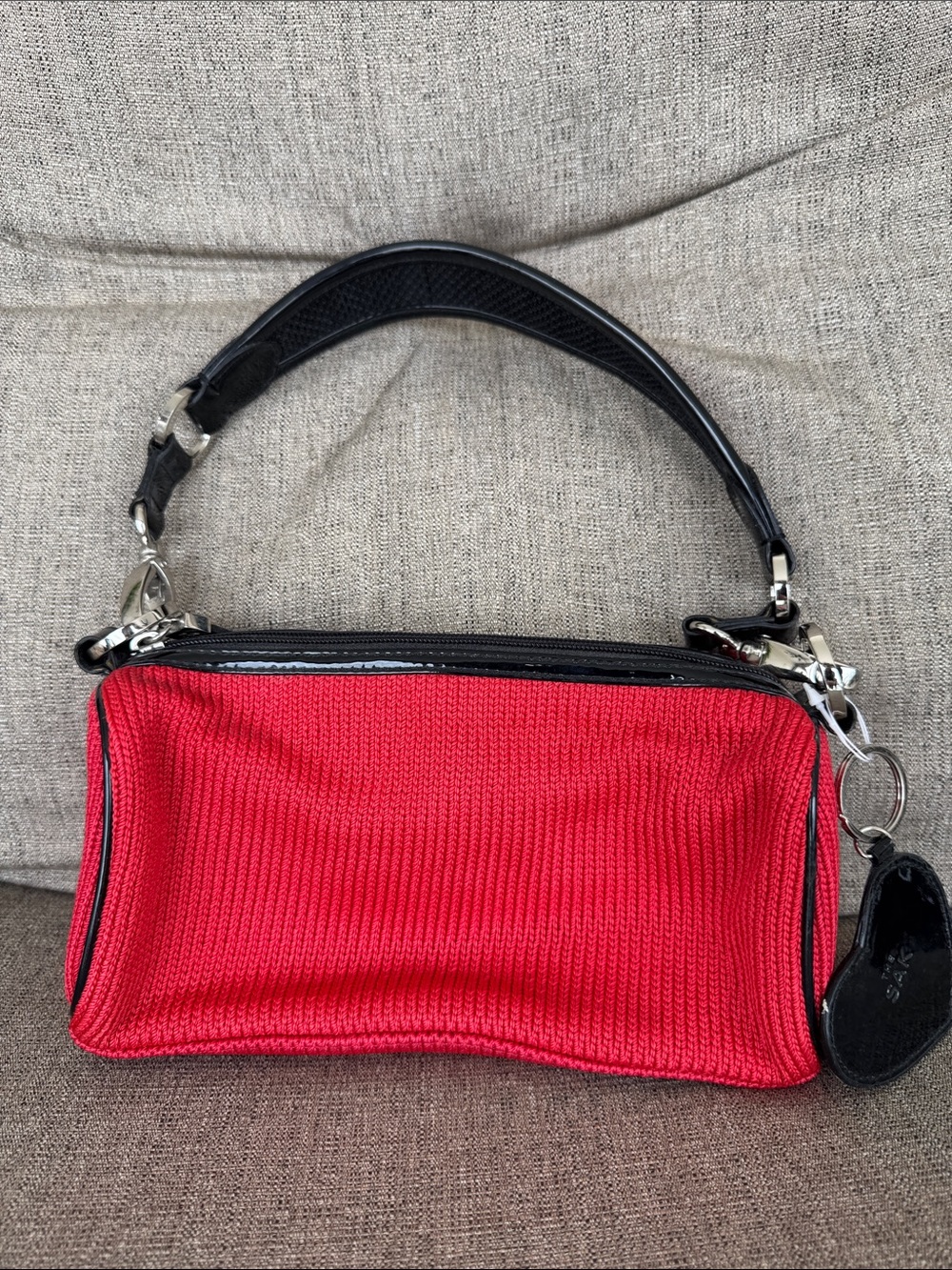 The Sak Red Shoulder Bag with Black Handle